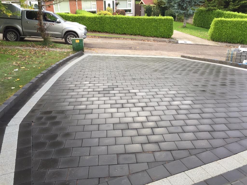 Paving Driveway and on Landscaping